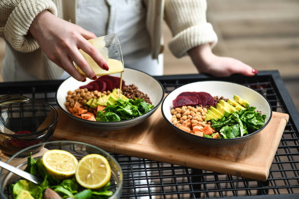 Fresh salad plates and utensils suggesting a weekly meal rhythm